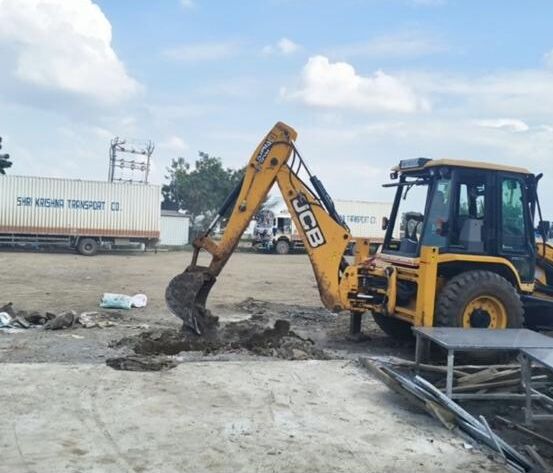Excavator carrying out civil excavation at the Sinnar site